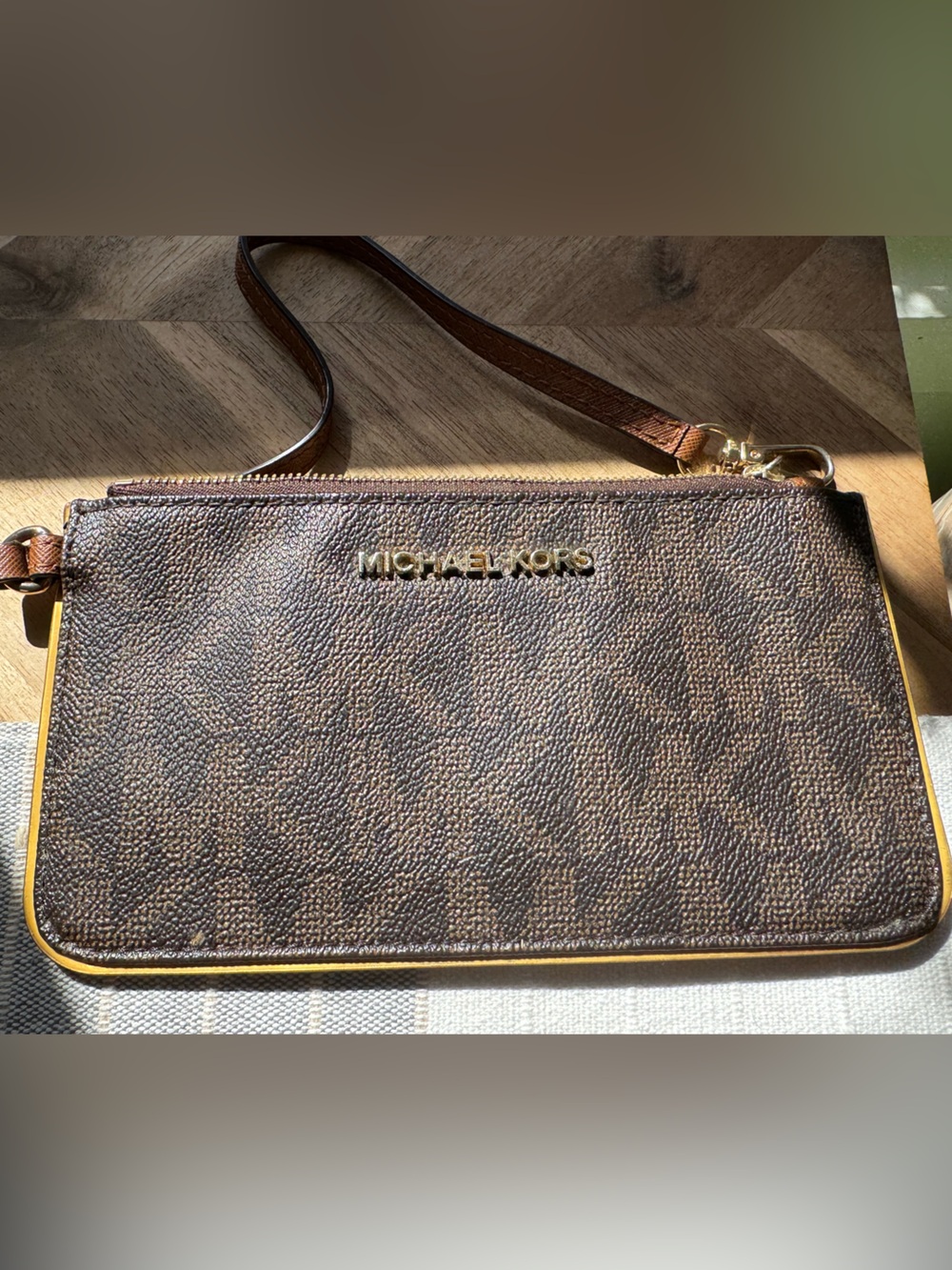 Michael Kors Jet Set Travel Large Top Zip Wristlet in brown monogram PVC